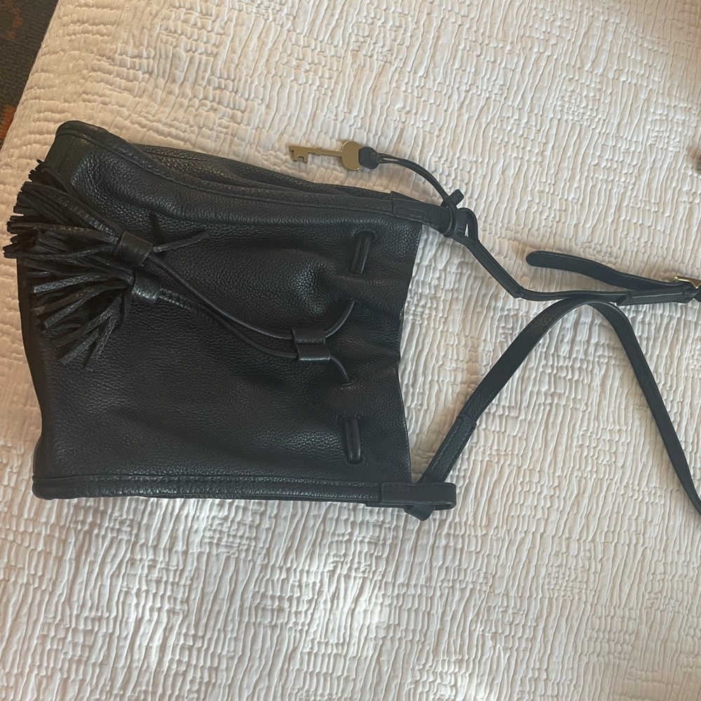 Fossil brand black drawstring bucket bag in excellent condition